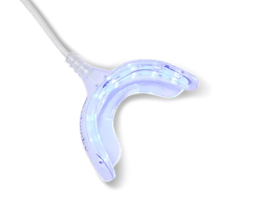 Clear dental tool with blue light on a white background