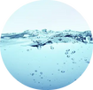 A circular graphic depicting a close-up of water with ripples, splashes, and small bubbles, rendered in shades of light blue and white.